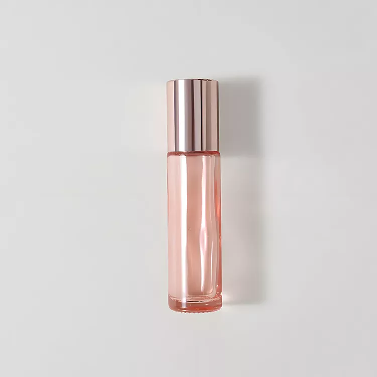 Cosmetic glass pink roll on bottle