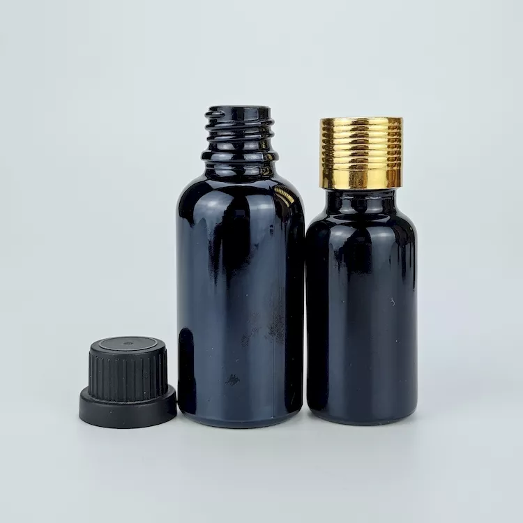 Black glass essential oil bottle