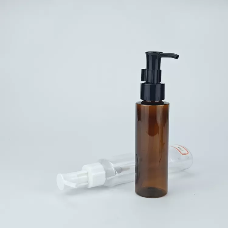 Cosmetic bottle with oil pump