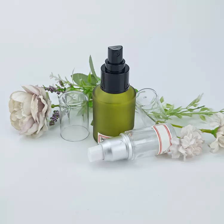 Glass cosmetic bottle with lotion pump