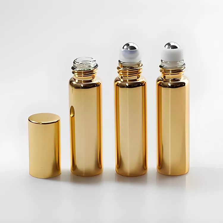 Golden glass bottle with roll on